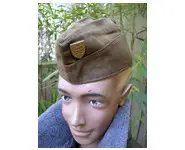Military forage cap with badge
